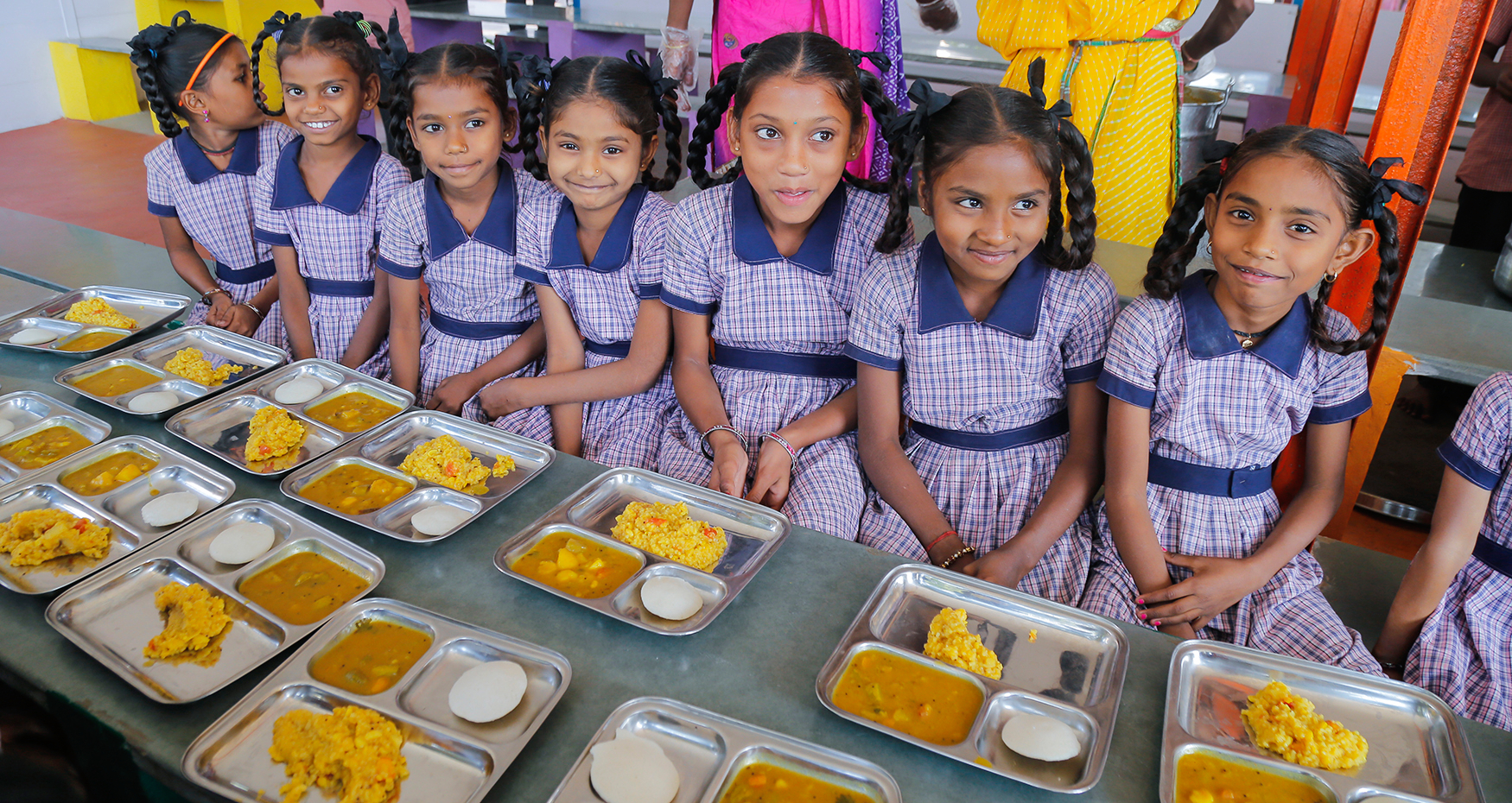 Children receiving nutritious meals at school